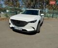 Білий Мазда СХ-9, об'ємом двигуна 2.49 л та пробігом 89 тис. км за 27000 $, фото 1 на Automoto.ua