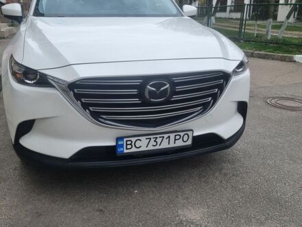 Белый Мазда СХ-9, объемом двигателя 2.49 л и пробегом 158 тыс. км за 24000 $, фото 1 на Automoto.ua