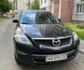 Черный Мазда СХ-9, объемом двигателя 3.5 л и пробегом 230 тыс. км за 9700 $, фото 1 на Automoto.ua