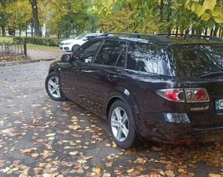 Черный Мазда СХ-9, объемом двигателя 1.99 л и пробегом 240 тыс. км за 4800 $, фото 4 на Automoto.ua