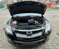 Черный Мазда СХ-9, объемом двигателя 3.7 л и пробегом 150 тыс. км за 10000 $, фото 1 на Automoto.ua
