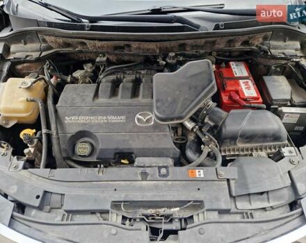 Черный Мазда СХ-9, объемом двигателя 3.73 л и пробегом 312 тыс. км за 7000 $, фото 2 на Automoto.ua