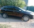 Черный Мазда СХ-9, объемом двигателя 3.7 л и пробегом 190 тыс. км за 9000 $, фото 1 на Automoto.ua