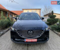 Черный Мазда СХ-9, объемом двигателя 2.49 л и пробегом 207 тыс. км за 18000 $, фото 1 на Automoto.ua