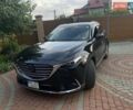 Черный Мазда СХ-9, объемом двигателя 2.49 л и пробегом 80 тыс. км за 28000 $, фото 1 на Automoto.ua