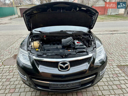 Черный Мазда СХ-9, объемом двигателя 3.7 л и пробегом 150 тыс. км за 10000 $, фото 1 на Automoto.ua