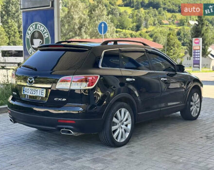 Черный Мазда СХ-9, объемом двигателя 3.73 л и пробегом 235 тыс. км за 8500 $, фото 1 на Automoto.ua