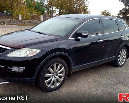 Черный Мазда СХ-9, объемом двигателя 3.7 л и пробегом 400 тыс. км за 8500 $, фото 1 на Automoto.ua