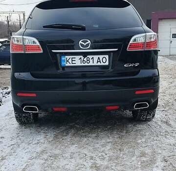 Черный Мазда СХ-9, объемом двигателя 3.7 л и пробегом 184 тыс. км за 11000 $, фото 1 на Automoto.ua