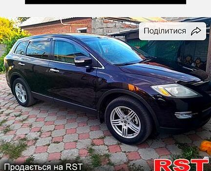 Фиолетовый Мазда СХ-9, объемом двигателя 3.5 л и пробегом 210 тыс. км за 10000 $, фото 1 на Automoto.ua