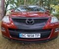 Красный Мазда СХ-9, объемом двигателя 3.5 л и пробегом 202 тыс. км за 8800 $, фото 1 на Automoto.ua
