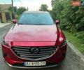 Красный Мазда СХ-9, объемом двигателя 2.49 л и пробегом 49 тыс. км за 27500 $, фото 1 на Automoto.ua