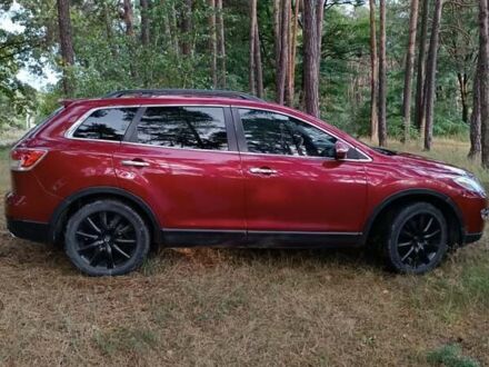 Красный Мазда СХ-9, объемом двигателя 3.5 л и пробегом 202 тыс. км за 8800 $, фото 1 на Automoto.ua