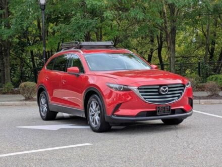 Красный Мазда СХ-9, объемом двигателя 2.5 л и пробегом 75 тыс. км за 16000 $, фото 1 на Automoto.ua