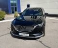 Мазда СХ-9, объемом двигателя 2.5 л и пробегом 100 тыс. км за 23500 $, фото 1 на Automoto.ua