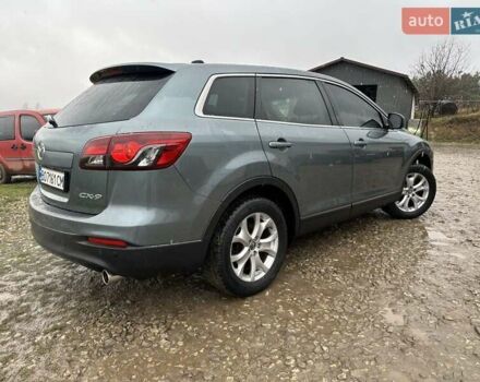 Серый Мазда СХ-9, объемом двигателя 3.73 л и пробегом 250 тыс. км за 9799 $, фото 1 на Automoto.ua