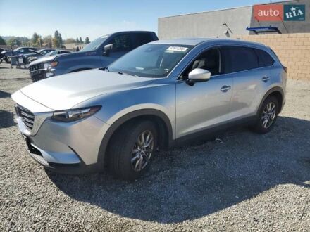 Серый Мазда СХ-9, объемом двигателя 2.49 л и пробегом 103 тыс. км за 5500 $, фото 1 на Automoto.ua