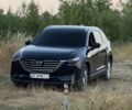 Синий Мазда СХ-9, объемом двигателя 2.5 л и пробегом 128 тыс. км за 18200 $, фото 1 на Automoto.ua