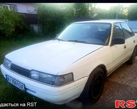 Белый Мазда Капелла, объемом двигателя 1.8 л и пробегом 520 тыс. км за 700 $, фото 2 на Automoto.ua