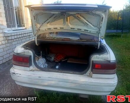 Белый Мазда Капелла, объемом двигателя 1.8 л и пробегом 520 тыс. км за 700 $, фото 4 на Automoto.ua