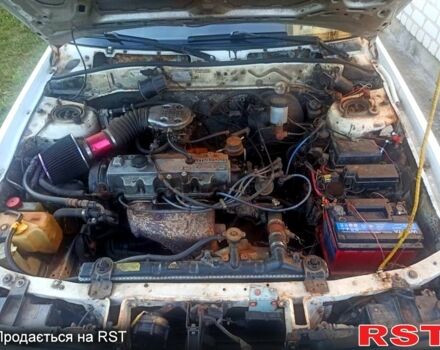 Белый Мазда Капелла, объемом двигателя 1.8 л и пробегом 520 тыс. км за 700 $, фото 3 на Automoto.ua