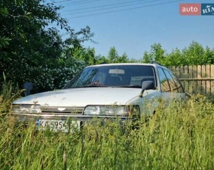 Белый Мазда Капелла, объемом двигателя 1.6 л и пробегом 154 тыс. км за 3000 $, фото 9 на Automoto.ua