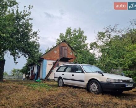 Белый Мазда Капелла, объемом двигателя 1.6 л и пробегом 154 тыс. км за 3000 $, фото 10 на Automoto.ua