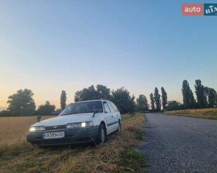 Белый Мазда Капелла, объемом двигателя 1.6 л и пробегом 154 тыс. км за 3000 $, фото 8 на Automoto.ua