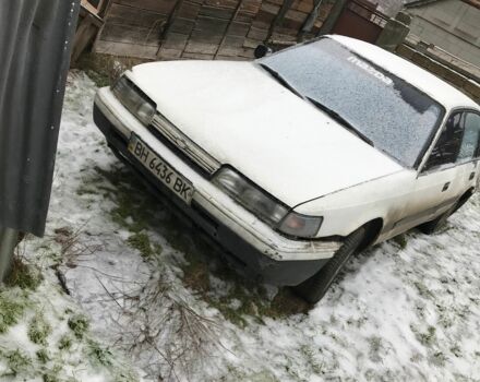 Белый Мазда Капелла, объемом двигателя 1.8 л и пробегом 2 тыс. км за 466 $, фото 1 на Automoto.ua