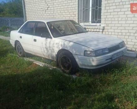 Білий Мазда Капелла, об'ємом двигуна 1.79 л та пробігом 450 тис. км за 700 $, фото 1 на Automoto.ua
