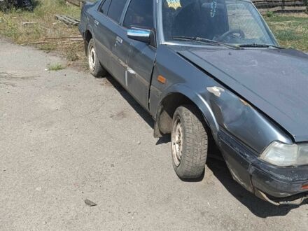 Серый Мазда Капелла, объемом двигателя 1.8 л и пробегом 2 тыс. км за 358 $, фото 1 на Automoto.ua