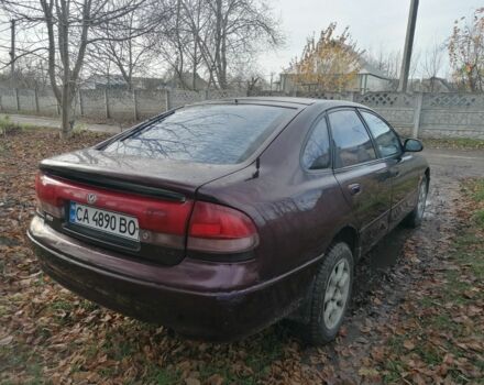 Фиолетовый Мазда Кронос, объемом двигателя 2 л и пробегом 250 тыс. км за 1700 $, фото 1 на Automoto.ua