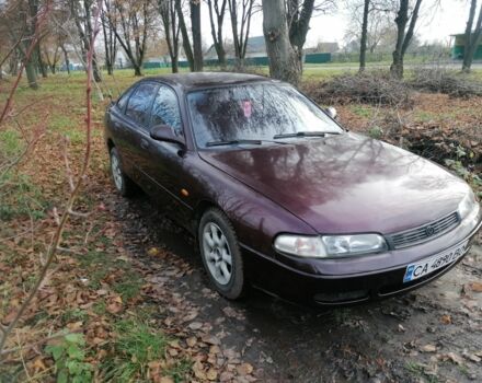 Фиолетовый Мазда Кронос, объемом двигателя 2 л и пробегом 250 тыс. км за 1700 $, фото 1 на Automoto.ua