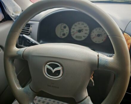 Черный Мазда Демио, объемом двигателя 1.5 л и пробегом 280 тыс. км за 2500 $, фото 7 на Automoto.ua