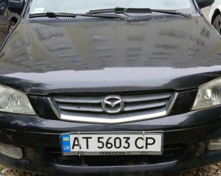 Черный Мазда Демио, объемом двигателя 1.5 л и пробегом 280 тыс. км за 2500 $, фото 3 на Automoto.ua