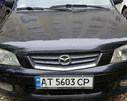 Черный Мазда Демио, объемом двигателя 1.5 л и пробегом 280 тыс. км за 2500 $, фото 1 на Automoto.ua