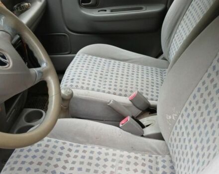 Черный Мазда Демио, объемом двигателя 1.5 л и пробегом 280 тыс. км за 2500 $, фото 4 на Automoto.ua