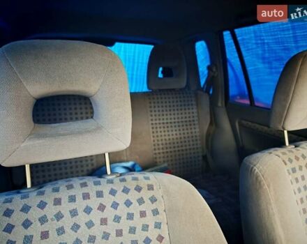 Черный Мазда Демио, объемом двигателя 1.5 л и пробегом 280 тыс. км за 2500 $, фото 5 на Automoto.ua