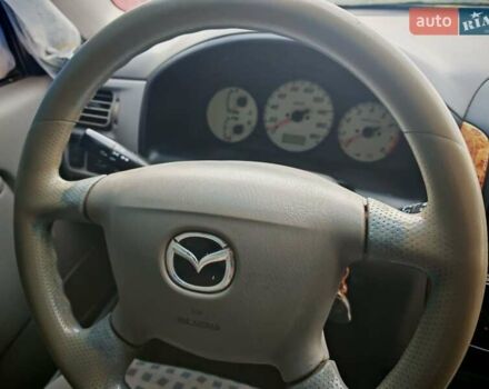 Черный Мазда Демио, объемом двигателя 1.5 л и пробегом 280 тыс. км за 2500 $, фото 7 на Automoto.ua