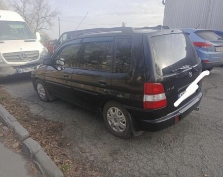 Чорний Мазда Деміо, об'ємом двигуна 1 л та пробігом 1 тис. км за 2600 $, фото 1 на Automoto.ua