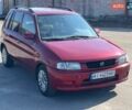 Червоний Мазда Деміо, об'ємом двигуна 1.4 л та пробігом 471 тис. км за 2600 $, фото 3 на Automoto.ua