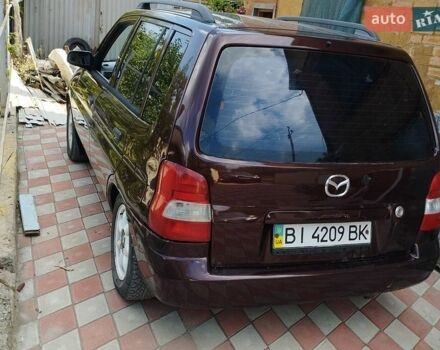 Красный Мазда Демио, объемом двигателя 1.6 л и пробегом 200 тыс. км за 2507 $, фото 1 на Automoto.ua