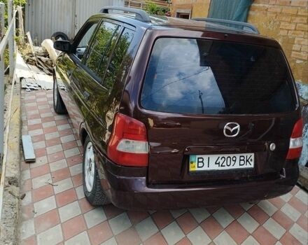 Красный Мазда Демио, объемом двигателя 1.6 л и пробегом 340 тыс. км за 2231 $, фото 1 на Automoto.ua