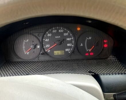 Сірий Мазда Деміо, об'ємом двигуна 1.3 л та пробігом 444 тис. км за 1400 $, фото 5 на Automoto.ua