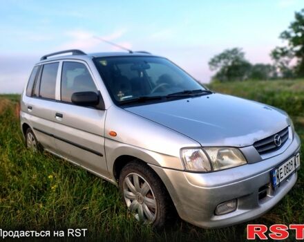 Серый Мазда Демио, объемом двигателя 1.5 л и пробегом 200 тыс. км за 3350 $, фото 1 на Automoto.ua