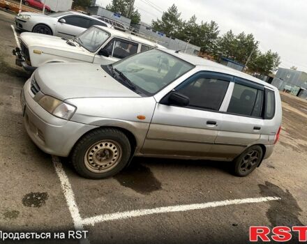 Серый Мазда Демио, объемом двигателя 1.3 л и пробегом 444 тыс. км за 1400 $, фото 1 на Automoto.ua