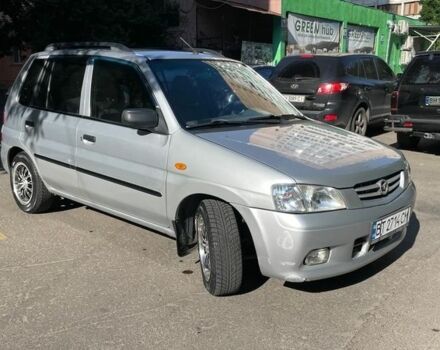 Серый Мазда Демио, объемом двигателя 1.5 л и пробегом 135 тыс. км за 3200 $, фото 1 на Automoto.ua