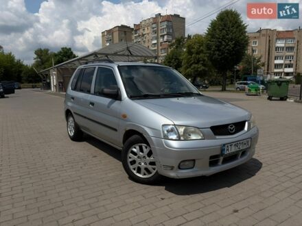 Серый Мазда Демио, объемом двигателя 1.5 л и пробегом 142 тыс. км за 1900 $, фото 1 на Automoto.ua