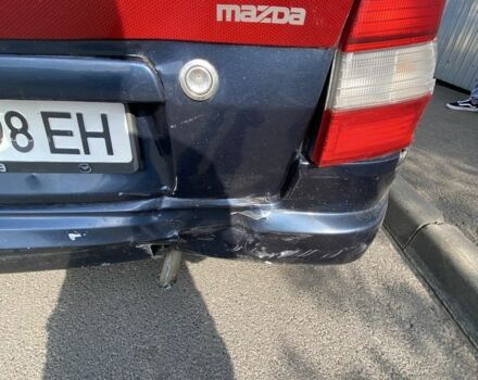 Синій Мазда Деміо, об'ємом двигуна 1.3 л та пробігом 112 тис. км за 700 $, фото 5 на Automoto.ua