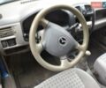 Синий Мазда Демио, объемом двигателя 1.5 л и пробегом 120 тыс. км за 2000 $, фото 3 на Automoto.ua